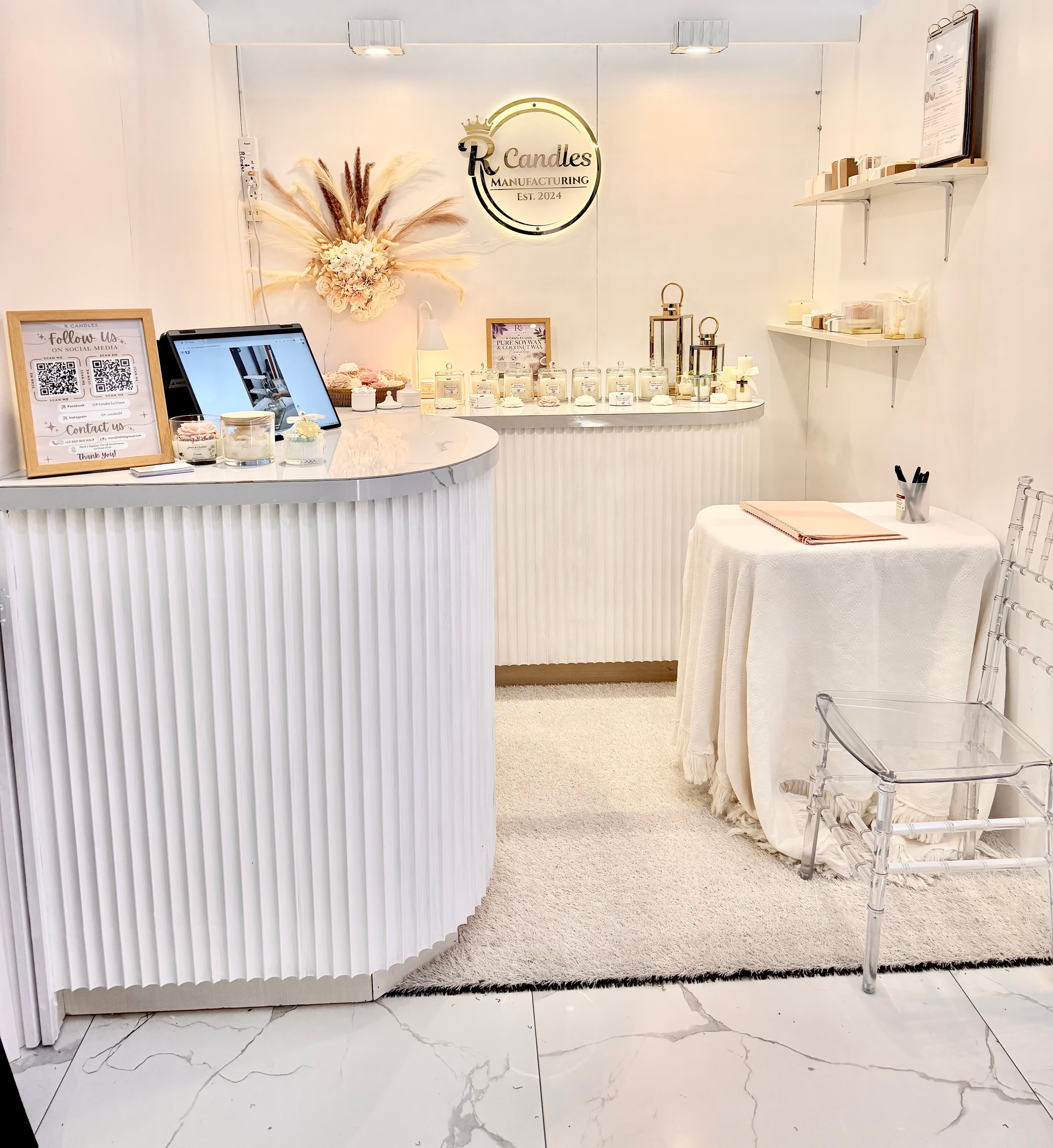Guests exploring the R Candles mobile candle bar booth